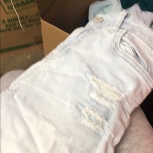 Light blue ripped jeans